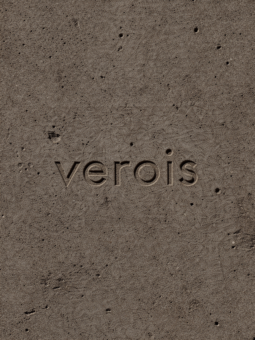verois — macro of embossed name on concrete